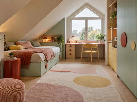 AI concept of a bedroom beneath a sloping ceiling with a bed and desk, with pastel furniture and geometric colour accents