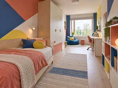 AI concept of a long bedroom with sleeping and study areas arranged along its length, with large geometric wall shapes and contrasting colours