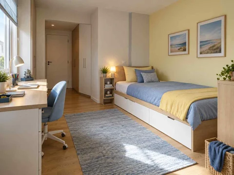 AI concept of a bedroom with a study desk and storage beside the sleeping area, with pale furniture and sunny yellow textiles